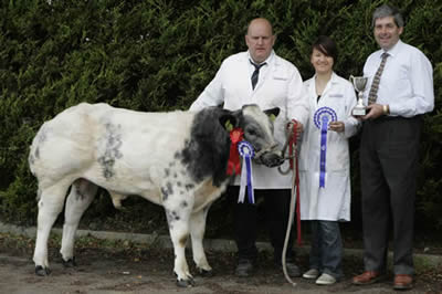 Ernie and Rebecca Gregg overall reserve show champion and male champion with Wilfred Lomas judge